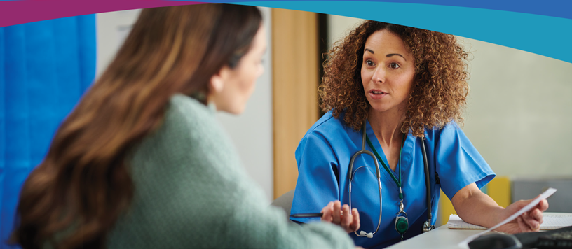 Healthcare provider talking to a patient.