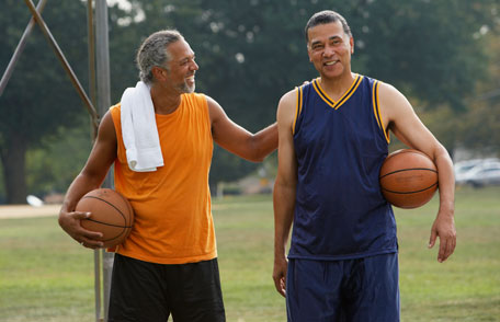 Two men standing next to each other