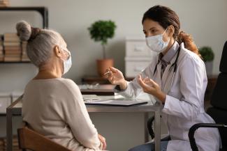 Healthcare Worker talking to patient